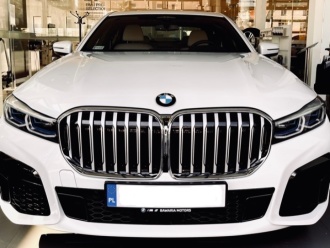 BMW serii 7 Biała perła z białymi skórami . Rok produkcji 2021,  Elbląg