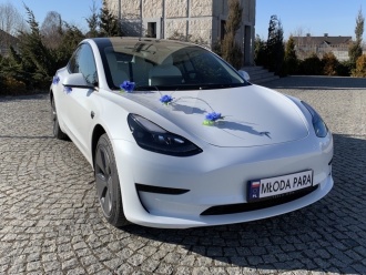 Biała Tesla model 3 2022 | Auto do ślubu Warszawa, mazowieckie