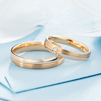 Dwukolorowe złote obrączki ślubne z diamentem - zdjęcie 1